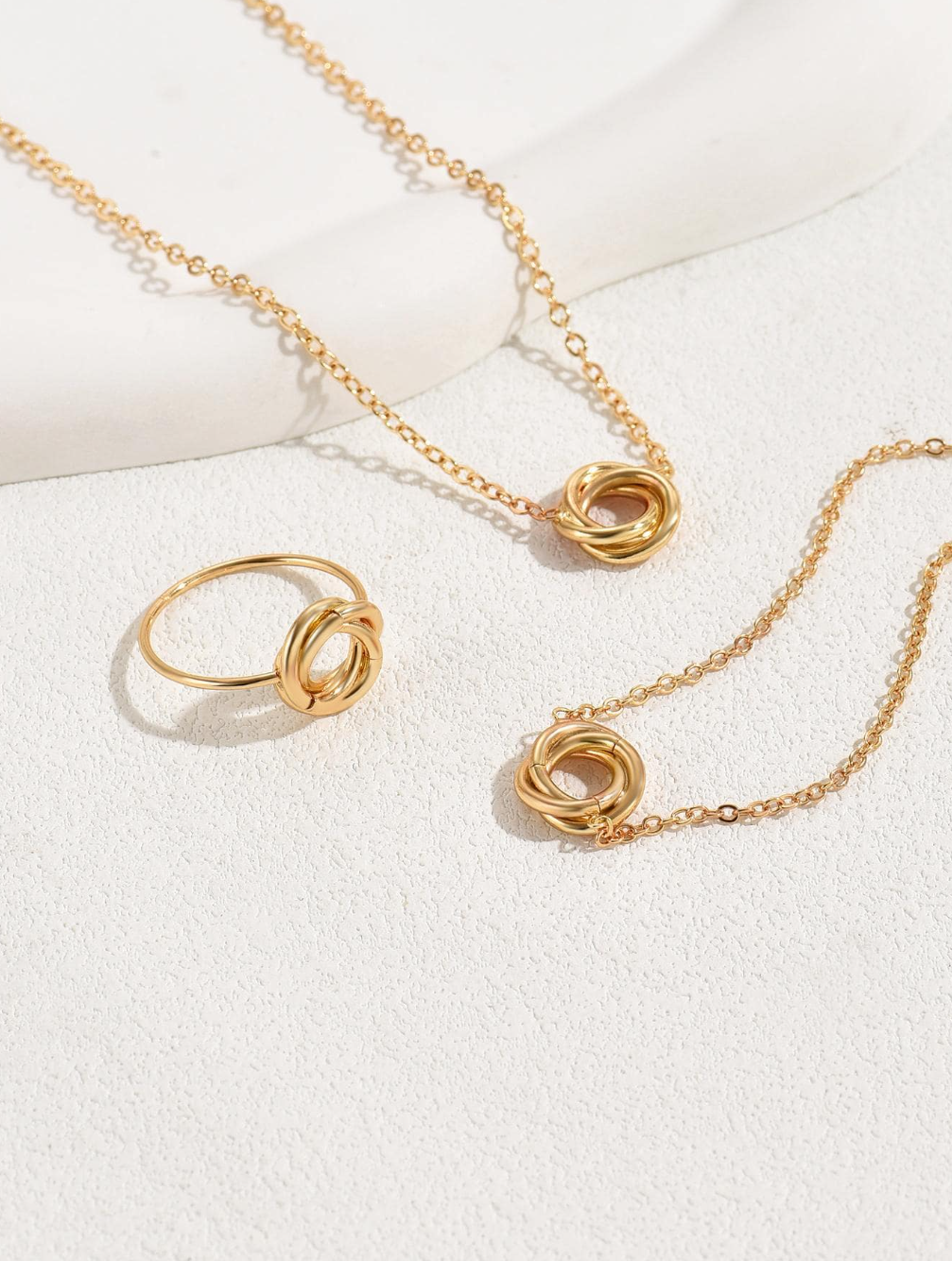 Ensemble de bijoux en trois pièces enroulé de fil de métal à la mode