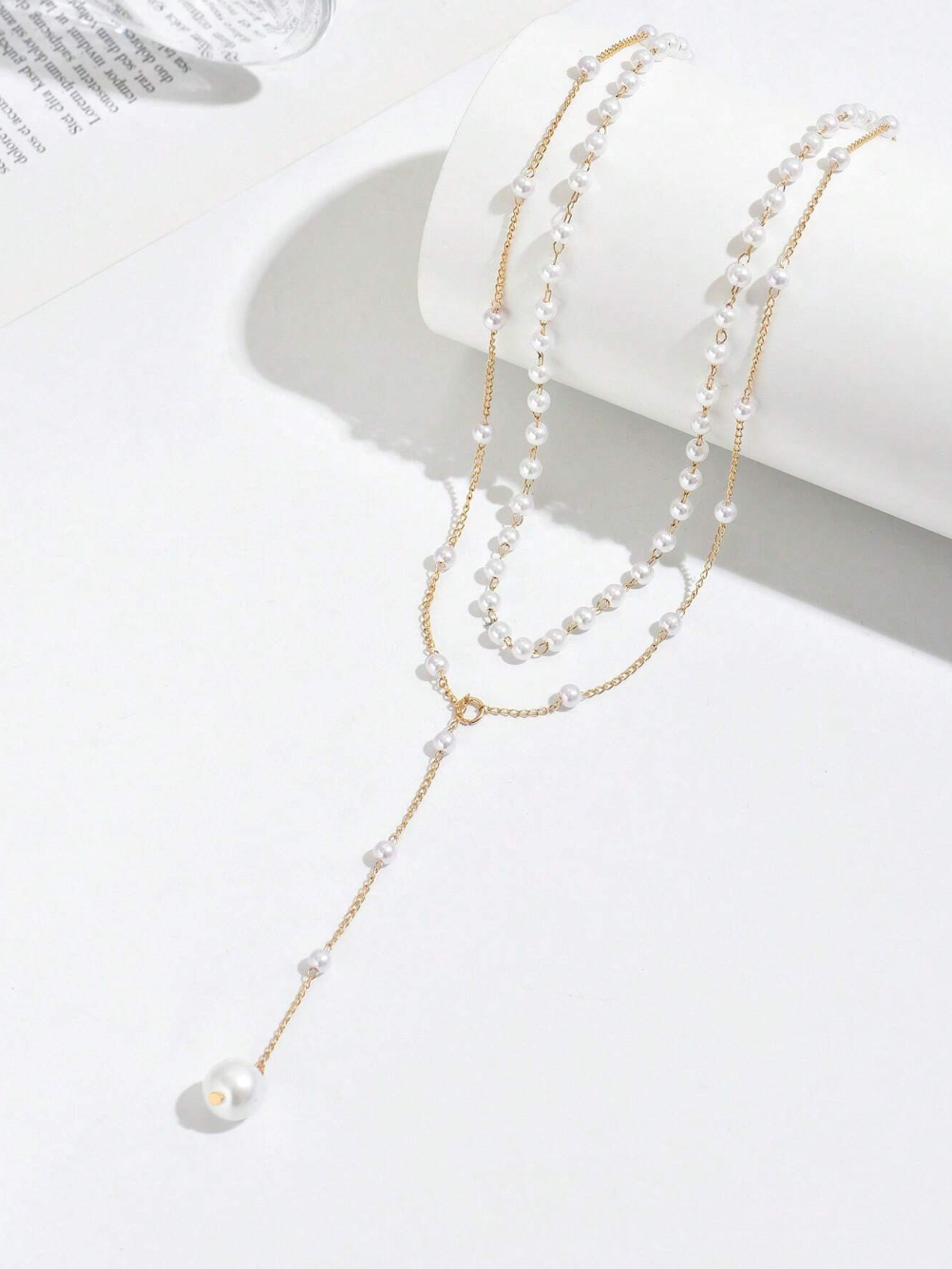 Collier superposé, détails décorés de strass et de fausses perles