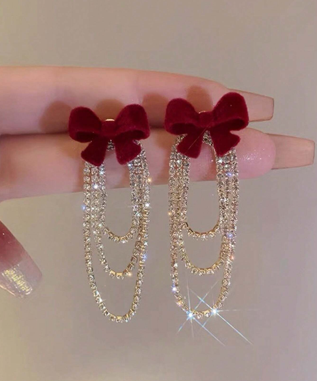 Paire de boucles d’oreilles à pompon papillon polyvalent à la mode