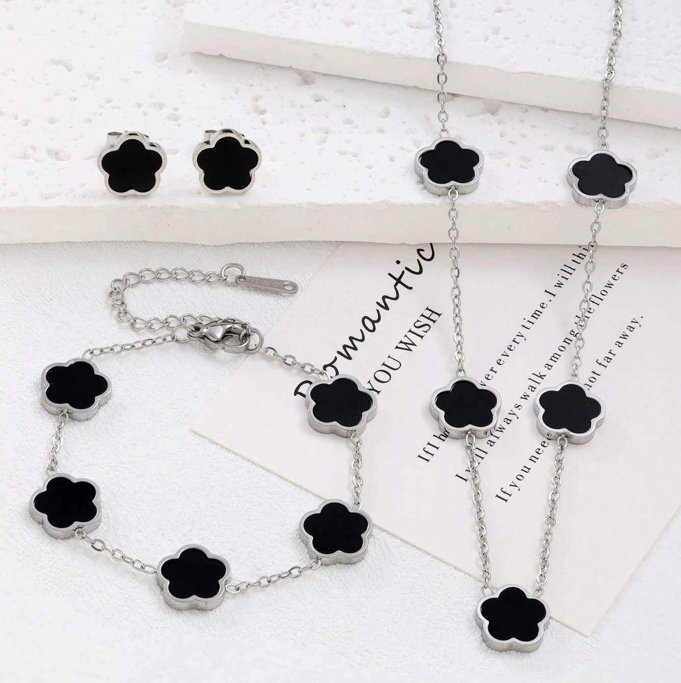 Ensemble de bijoux en acier inoxydable : collier, bracelet et des boucles d’oreilles